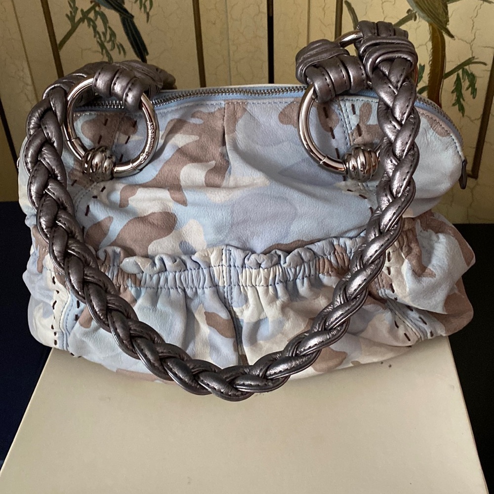 Brand new. Leather bag.